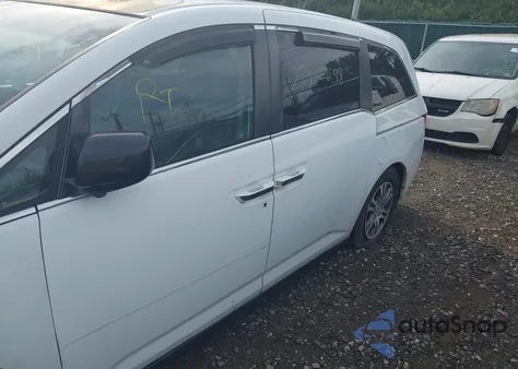 2011 Honda Odyssey Ex-L z USA, uszkodzony, nr VIN 5FNRL5H65BB010077